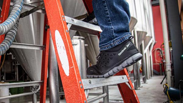 Man Standing On Ladder